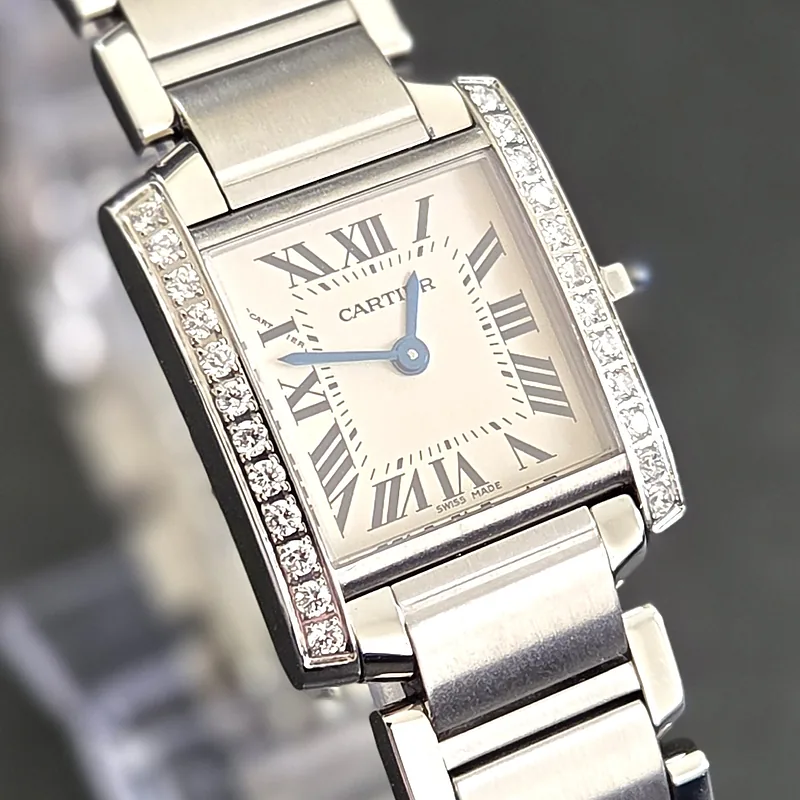 Cartier Tank Francaise ref. 2384, ivory dial featuring black roman numeral hour markers and blue hands - front view