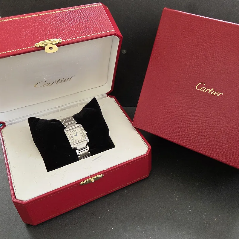 Cartier Tank Francaise ref. 2384, ivory dial featuring black roman numeral hour markers and blue hands - side profile