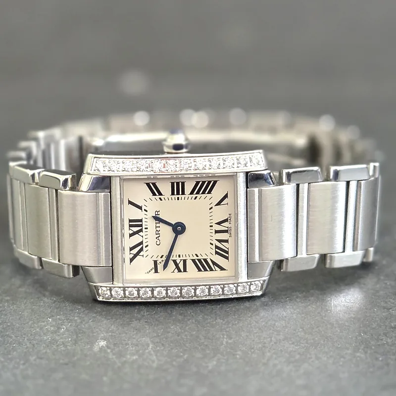 Cartier Tank Francaise ref. 2384, ivory dial featuring black roman numeral hour markers and blue hands - crown and case