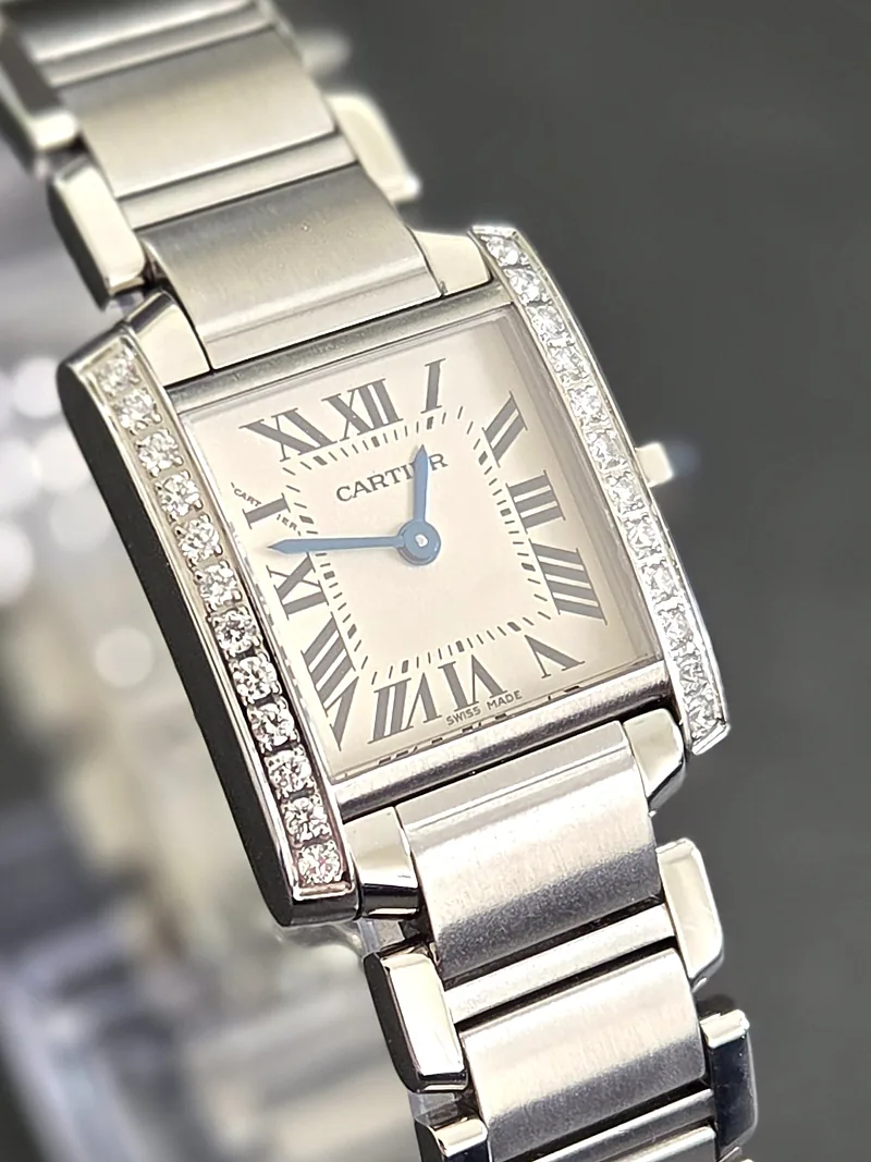 Pre-owned Cartier Tank Francaise ref. 2384 Circa 2000, Ivory dial featuring black roman numeral hour markers and blue hands