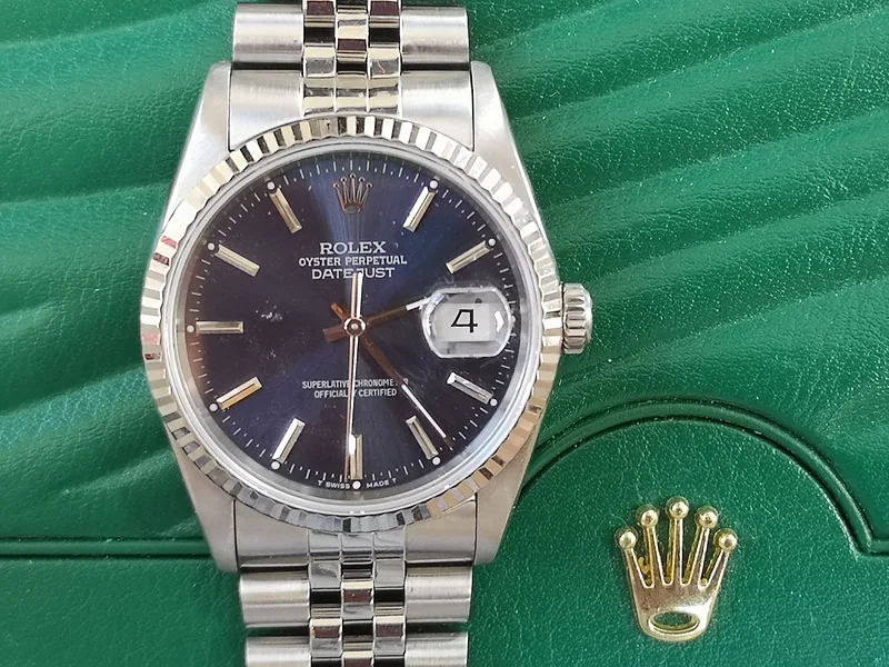 Rolex DateJust 36mm ref. 16220, blue with baton hour markers - crown and case