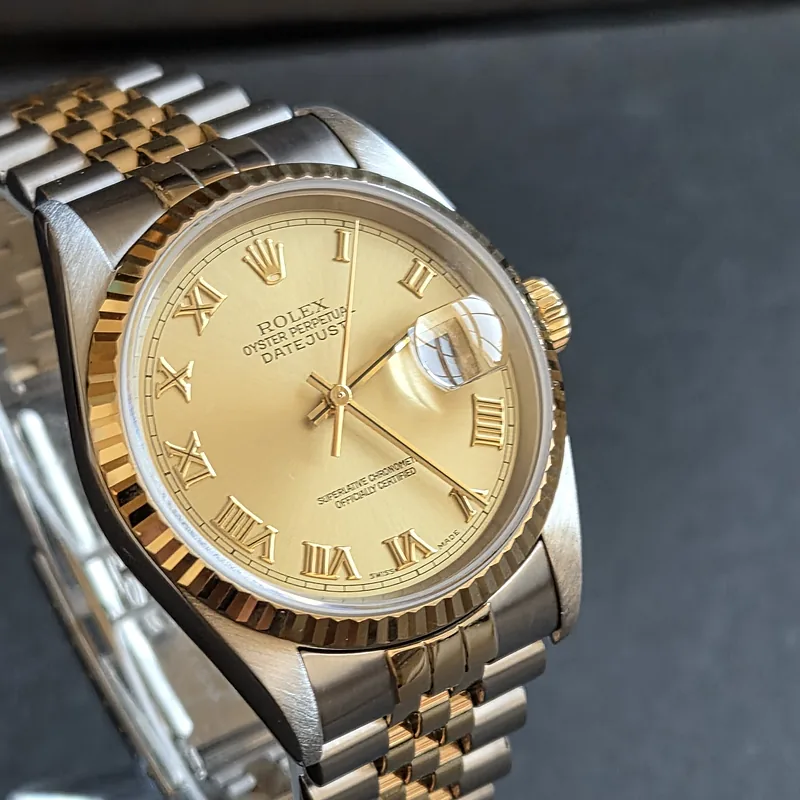 Rolex DateJust 36mm ref. 16233, champagne with gold roman numerals - front view