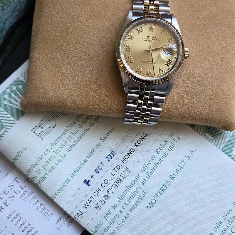 Rolex DateJust 36mm ref. 16233, champagne with gold roman numerals - dial close-up