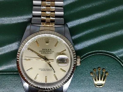 Rolex DateJust 36mm ref. 16233, champagne with gold baton hour markers - front view