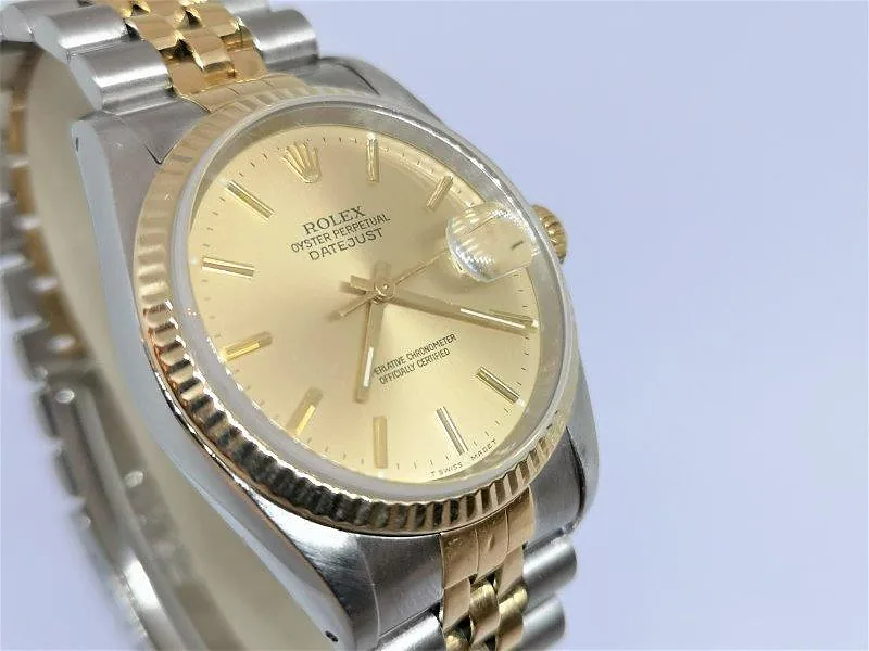 Rolex DateJust 36mm ref. 16233, champagne with gold baton hour markers - dial close-up