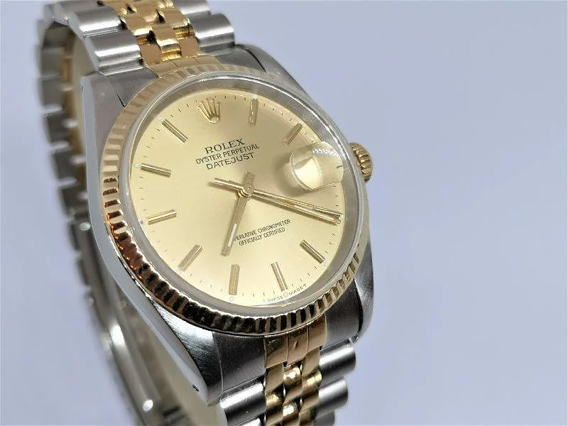 Rolex DateJust 36mm ref. 16233, champagne with gold baton hour markers - crown and case