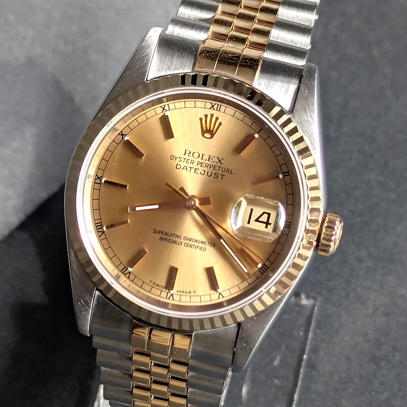 Rolex DateJust 36mm ref. 16233, champagne with gold baton hour markers - dial close-up
