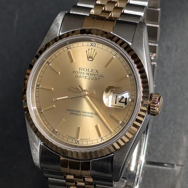 Rolex DateJust 36mm ref. 16233, champagne with gold baton hour markers - clasp