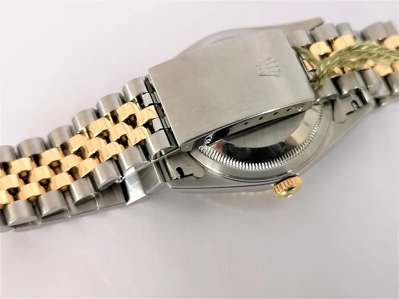Rolex DateJust 36mm ref. 16233, champagne with gold baton hour markers - crown and case