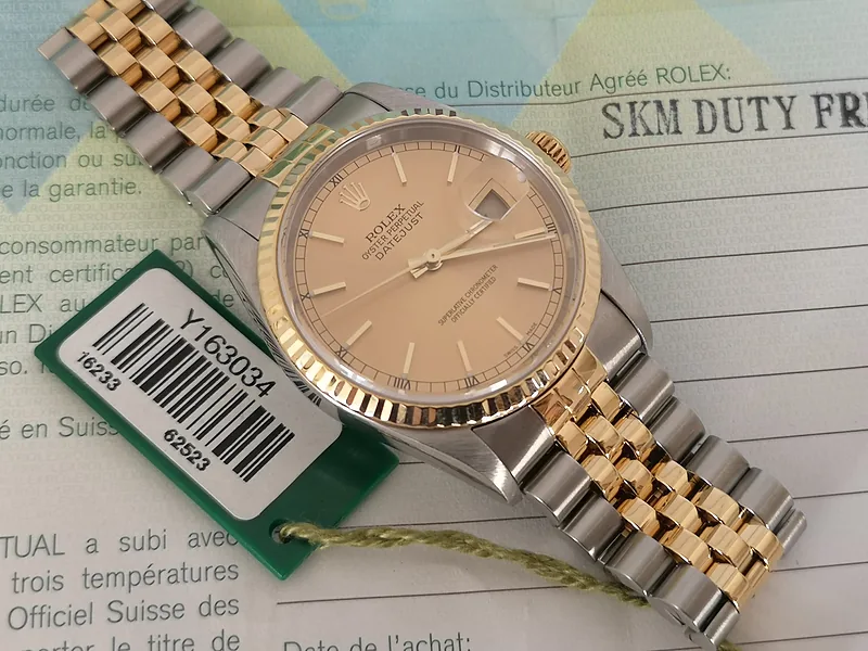 Rolex DateJust 36mm ref. 16233, champagne with gold baton hour markers - clasp