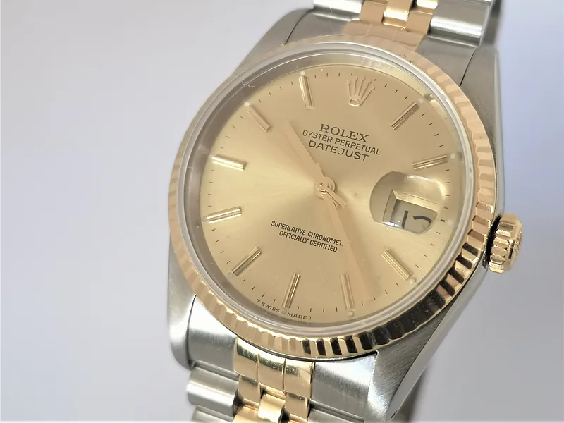 Rolex DateJust 36mm ref. 16233, champagne with gold baton hour markers - dial close-up