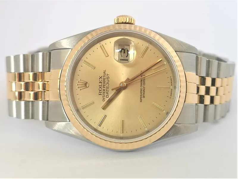 Rolex DateJust 36mm ref. 16233, champagne with gold baton hour markers - crown and case