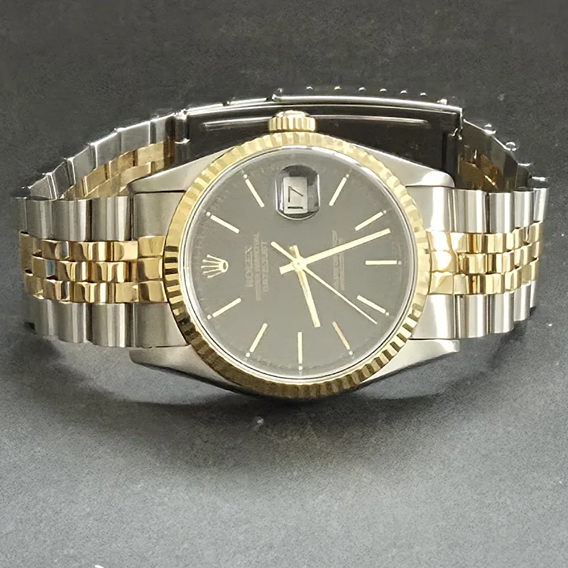 Rolex DateJust 36mm ref. 16233, black with gold baton hour markers - front view