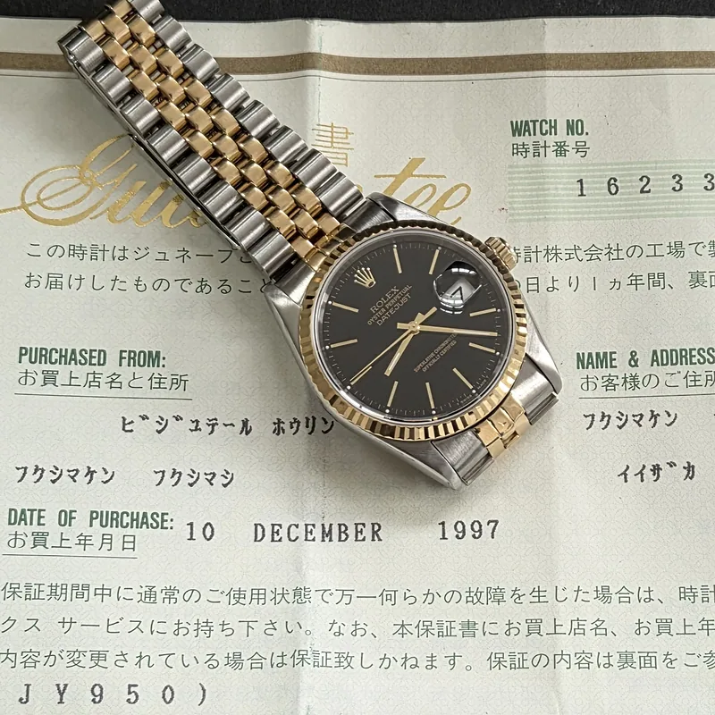Rolex DateJust 36mm ref. 16233, black with gold baton hour markers - bracelet
