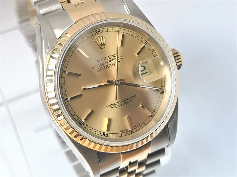 Rolex DateJust 36mm ref. 16233, champagne with gold baton hour markers - front view