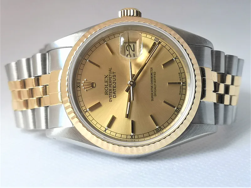 Rolex DateJust 36mm ref. 16233, champagne with gold baton hour markers - crown and case