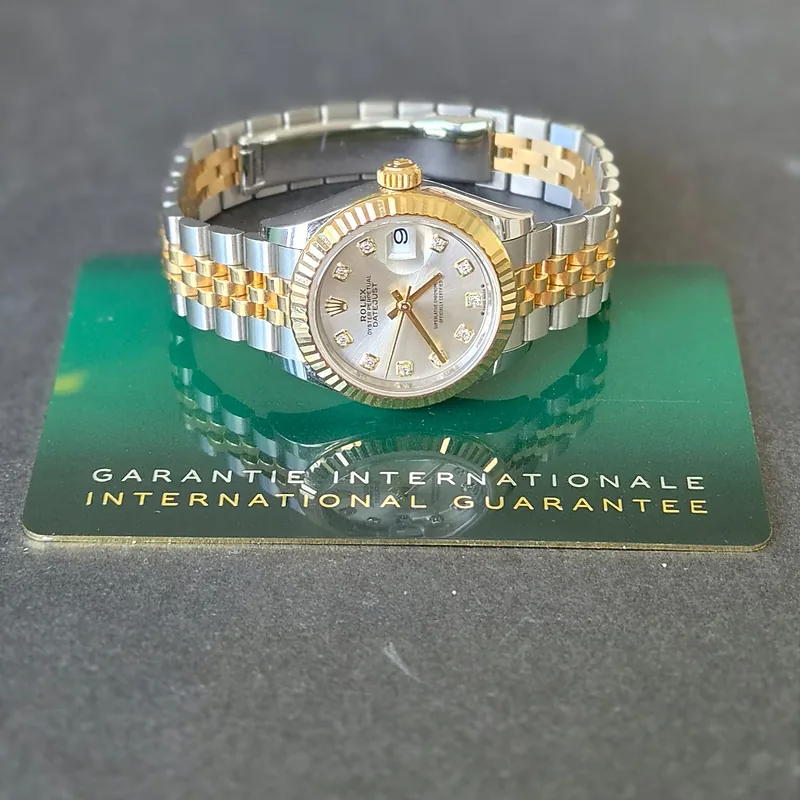 Rolex DateJust 28mm ref. 279173, original silver diamond dot dial - winding crown