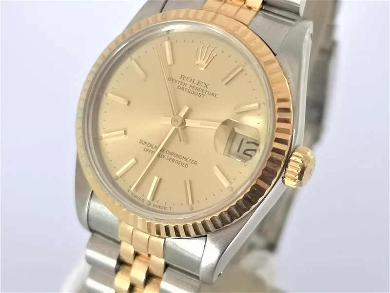 Rolex DateJust 31mm ref. 68273, champagne with gold batons - dial close-up