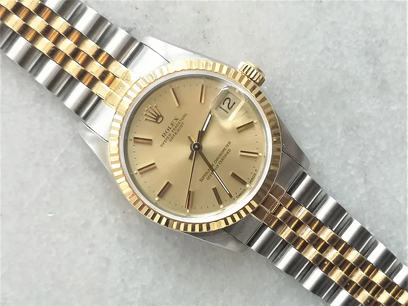 Rolex DateJust 31mm ref. 68273, champagne with gold batons - side profile