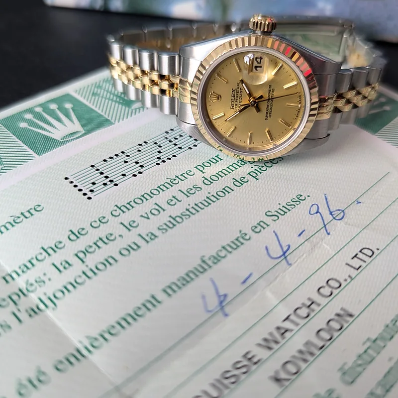 Rolex DateJust 26mm ref. 69173, champagne with gold baton hour markers - side profile