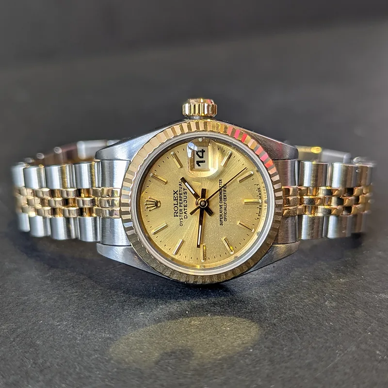 Rolex DateJust 26mm ref. 69173, champagne with gold baton hour markers - crown and case