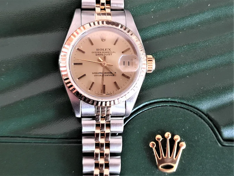 Rolex DateJust 26mm ref. 69173, classic champagne with gold baton hour markers - front view