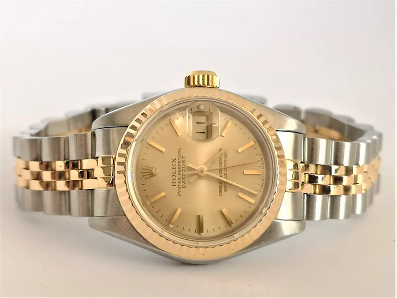 Rolex DateJust 26mm ref. 69173, classic champagne with gold baton hour markers - crown and case