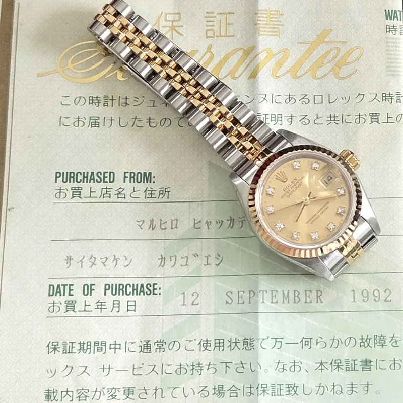 Rolex DateJust 26mm ref. 69173, factory champagne small diamond dot dial - side profile