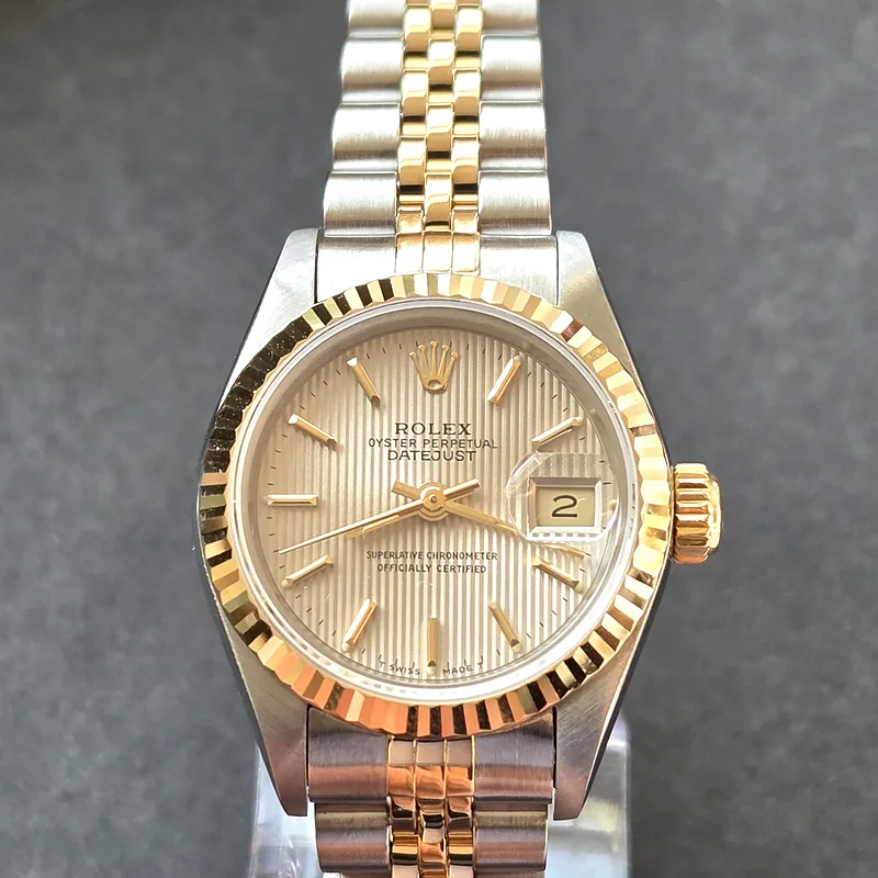 Rolex DateJust 26mm ref. 69173, silver tapestry with gold batons - dial close-up