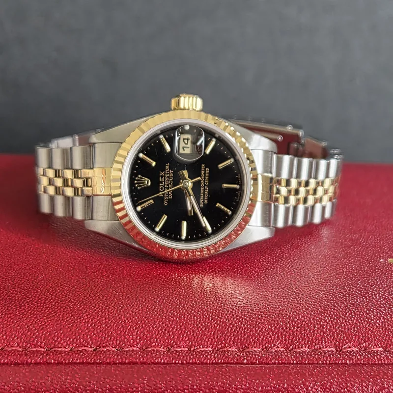 Rolex DateJust 26mm ref. 79173, black with gold batons - side profile