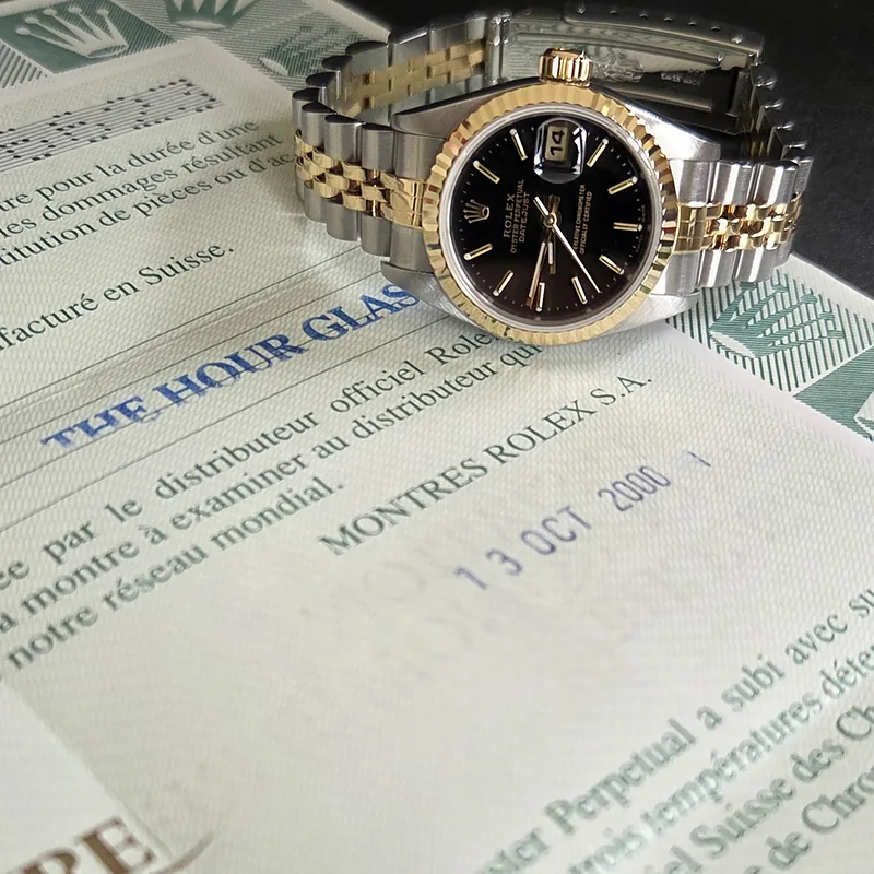 Rolex DateJust 26mm ref. 79173, black with gold batons - bracelet