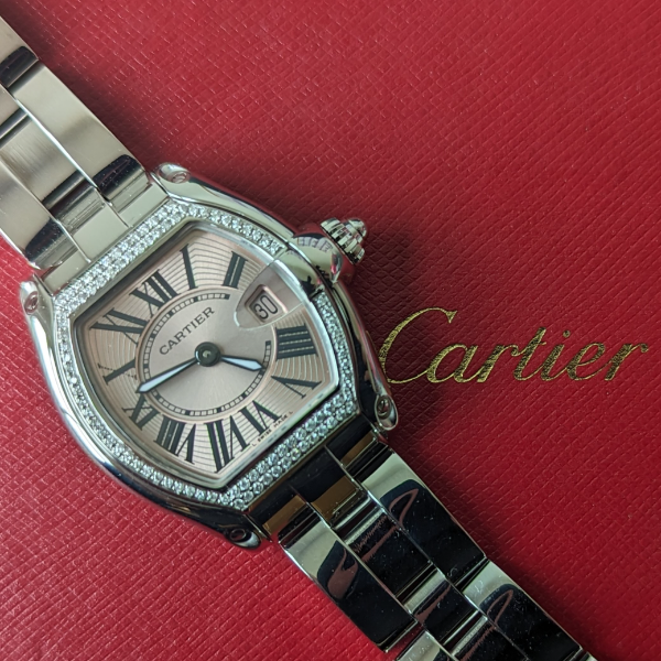 Pink dial Cartier Roadster crown