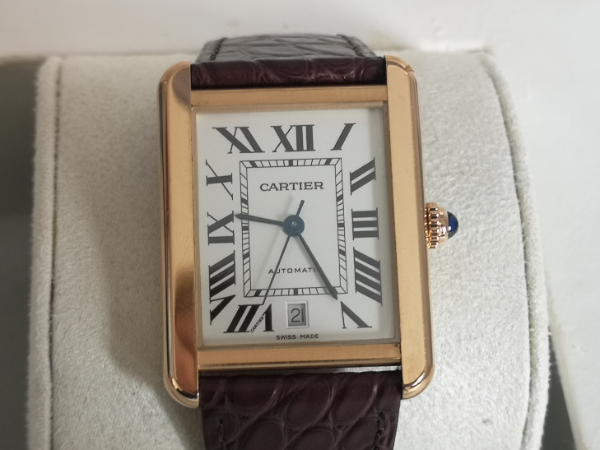 Rose gold Cartier watch clasp