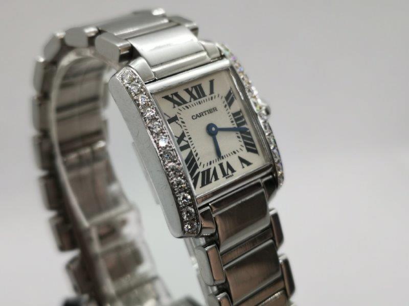 Beautiful ladies Cartier watch with afterset diamond bezel front