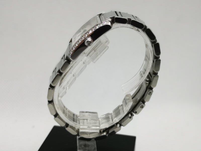 Beautiful ladies Cartier watch with afterset diamond bezel side