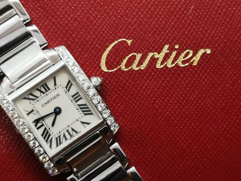 Gorgeous Cartier Tank Francaise with afterset Diamonds side