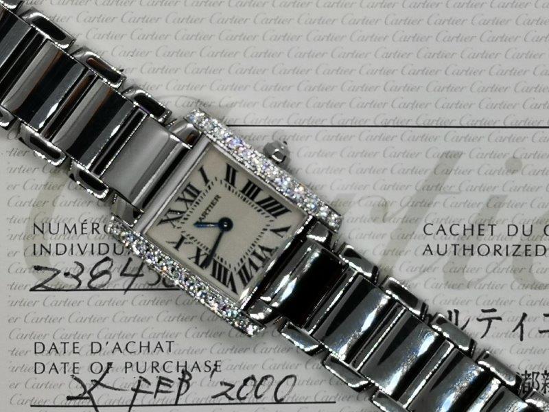 Gorgeous Cartier Tank Francaise with afterset Diamonds crown