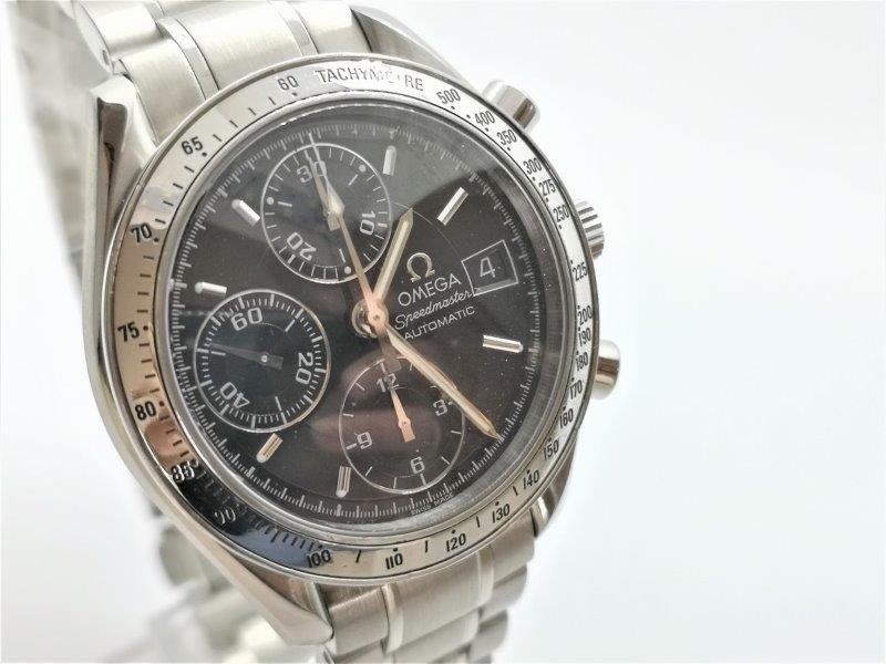 Omega Speedmaster Date ref. 35135000, black with white detailing and date - front view