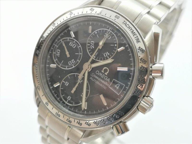 Omega Speedmaster Date ref. 35135000, black with white detailing and date - dial close-up
