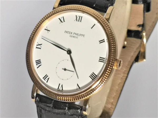 Gold Calatrava with papers dial