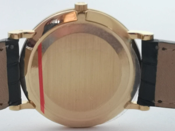 Gold Calatrava with papers bracelet