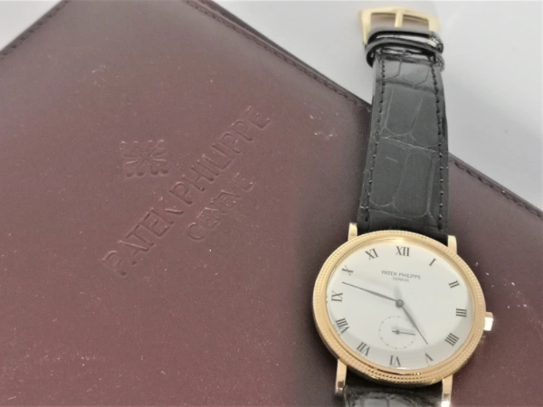 Gold Calatrava with papers clasp