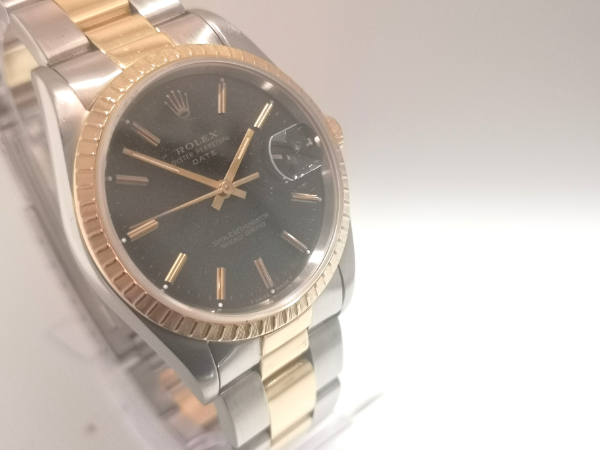 34mm Rolex Date steel and gold side
