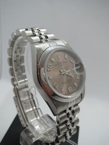 A more distinctive Ladies Rolex Date with Salmon dial.