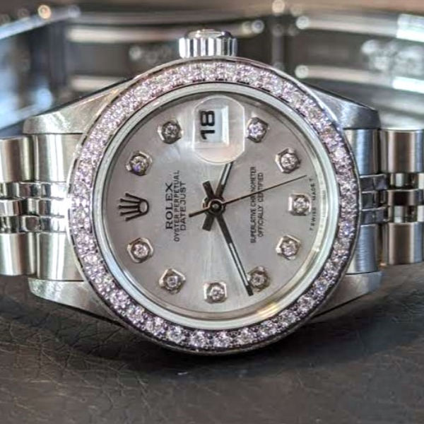 26mm Rolex Date with diamonds side