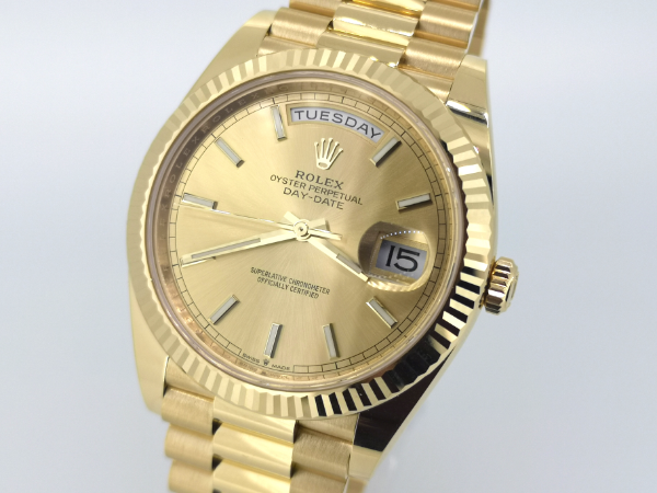 Gold Rolex Day-Date 40 with Full Set front