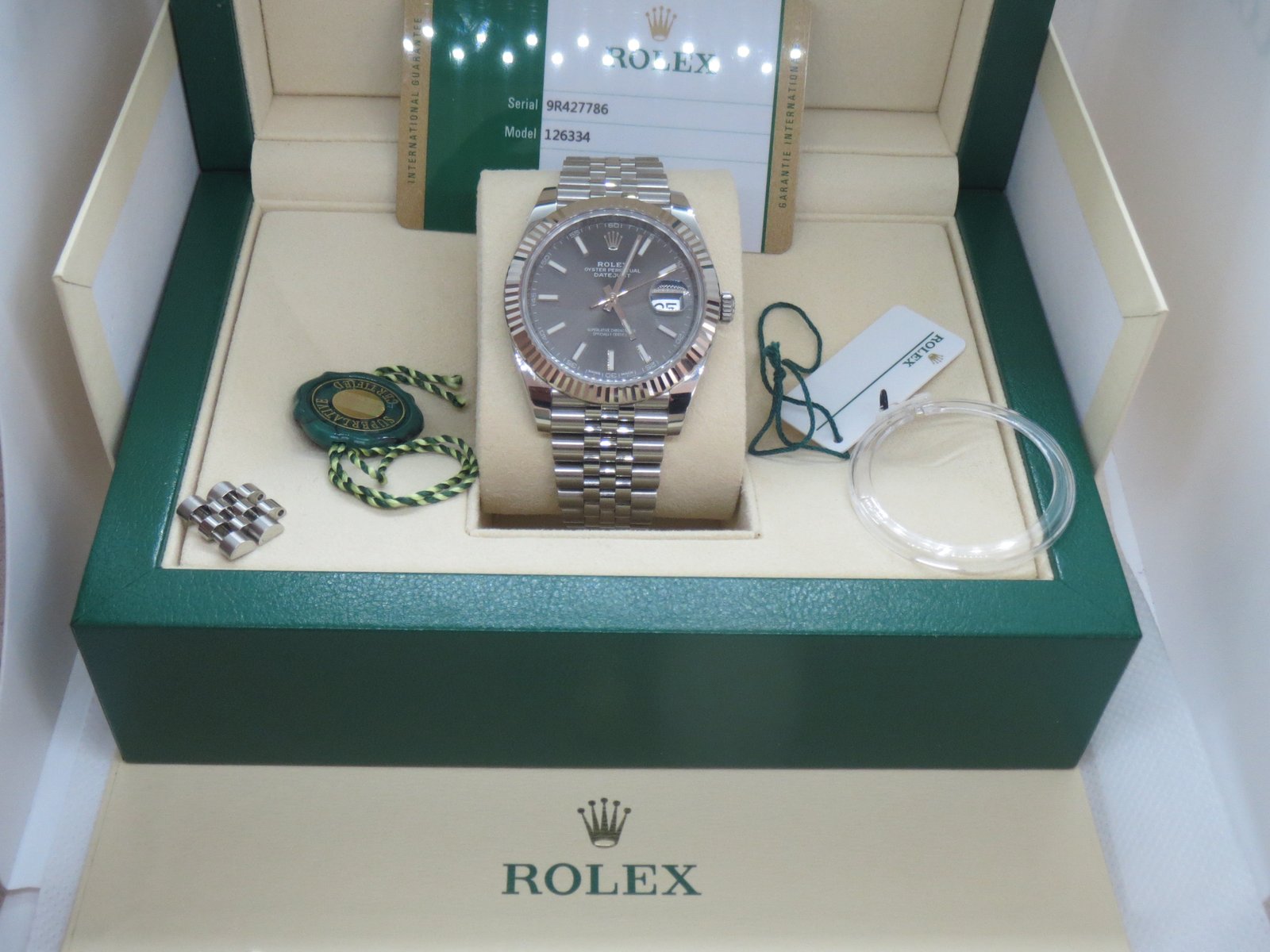 ROLEX DATEJUST ref. 126234, rhodium with baton hour markers - crown and case