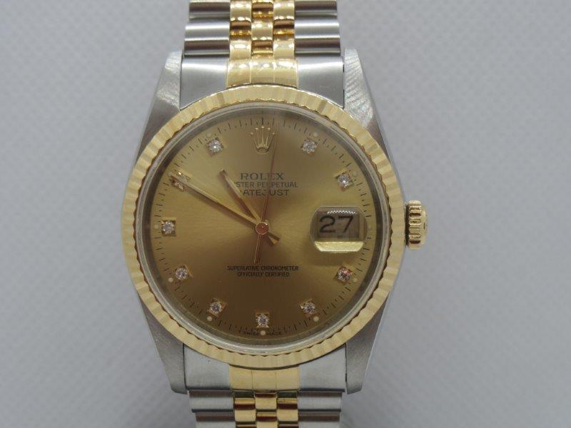 36mm Datejust in Steel and Gold with Champagne and Diamond Dot Dial  crown