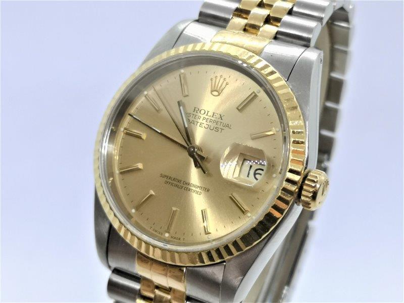 Classic Gold and Champagne Rolex front