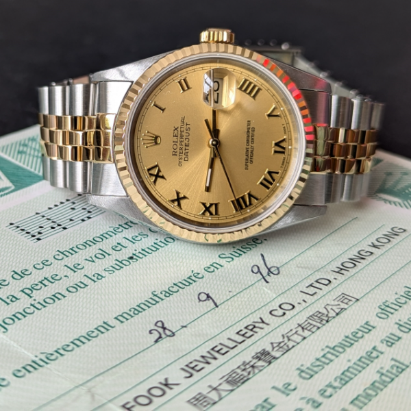 Champagne roman dial Rolex DateJust  dial